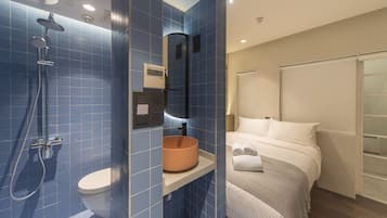 The Good Room | Bathroom | Shower, rainfall showerhead, free toiletries, hair dryer