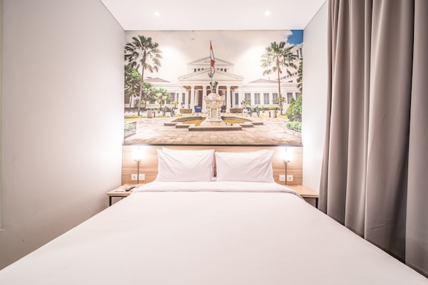 Habitación superior (Sunshine Day) | Escritorio, wifi gratis, ropa de cama