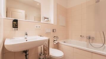 Hair dryer, towels, soap, toilet paper