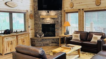 Älytelevisio, takka, pöytäjalkapallopöytä