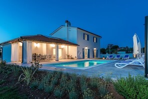 A two-story house with a swimming pool, outdoor seating, and a garden. - Villa 2095/39179 (Istria - Klarići), 13000m from the beach (Klarići)