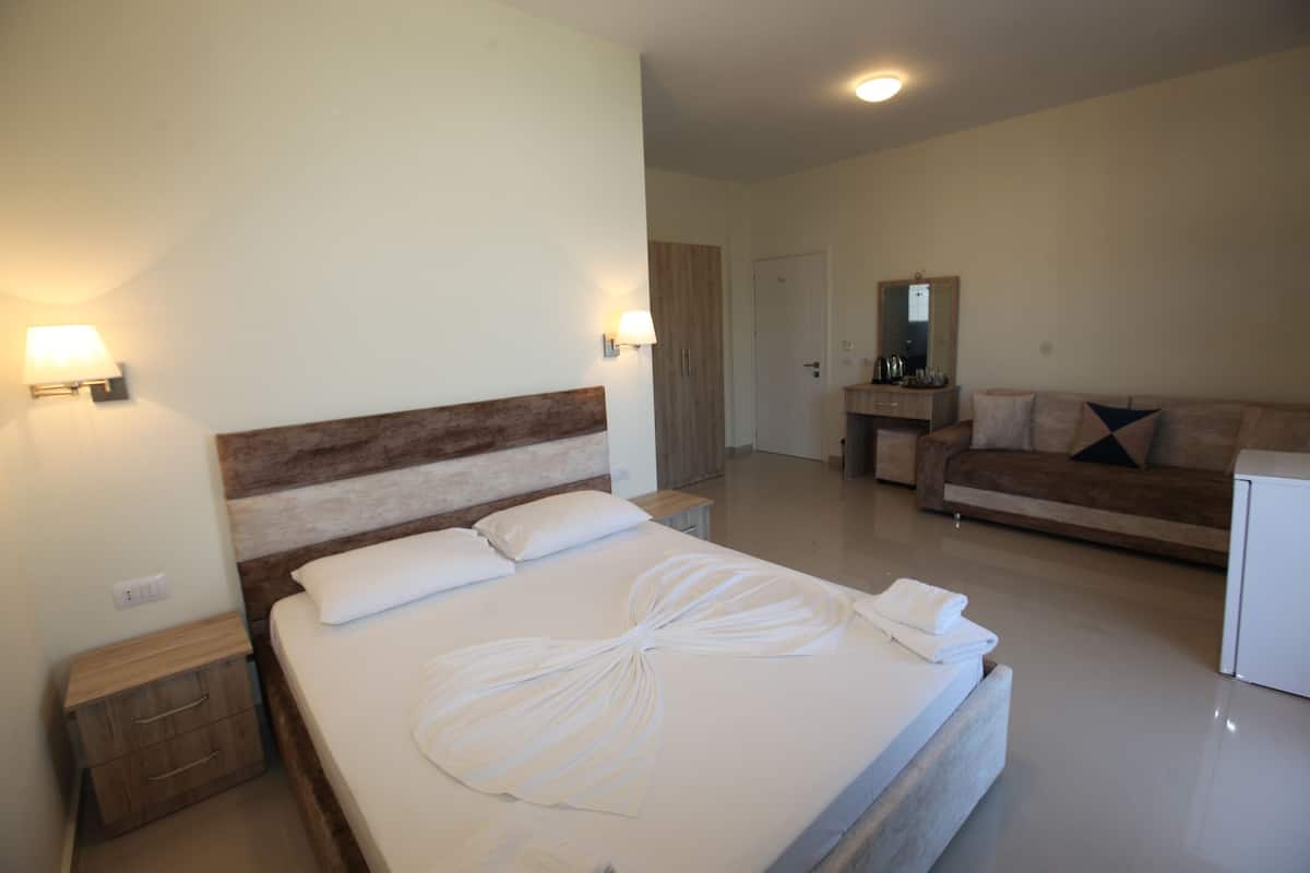 Chambre Quadruple Standard, balcon | 1 chambre, chambres insonorisées, Wi-Fi gratuit, draps fournis