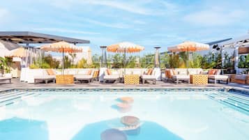 Outdoor pool, open 8:00 AM to 8:00 PM, sun loungers