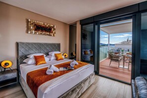 Lägenhet Panoramic - 1 sovrum - bubbelpool - havsutsikt | Värdeförvaringsskåp på rummet, individuell inredning och unika möbler