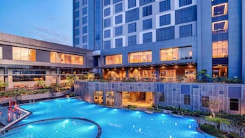 2 outdoor pools, open 6:00 AM to 7:00 PM, pool loungers