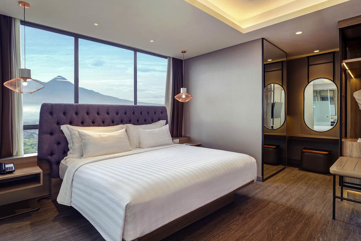 Suite – executive, 1 kingsize-seng, fjellutsikt | Sengetøy av topp kvalitet, minibar (inkludert) og safe på rommet
