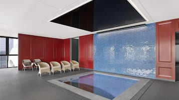Indoor pool, open 6:00 AM to 10:00 PM, sun loungers, lifeguards on site