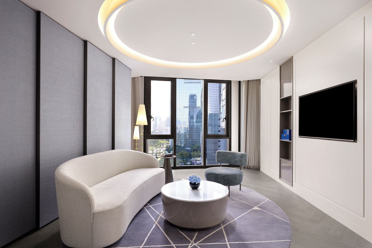 1 Bedroom Premier Suite with 1 King Size Bed | Living area | 55-inch Smart TV with digital channels, TV, smart speakers