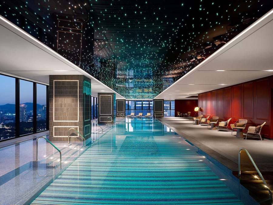 Indoor pool, open 6:00 AM to 10:00 PM, sun loungers, lifeguards on site