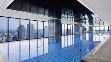 Indoor pool, open 6:00 AM to 10:00 PM, sun loungers, lifeguards on site