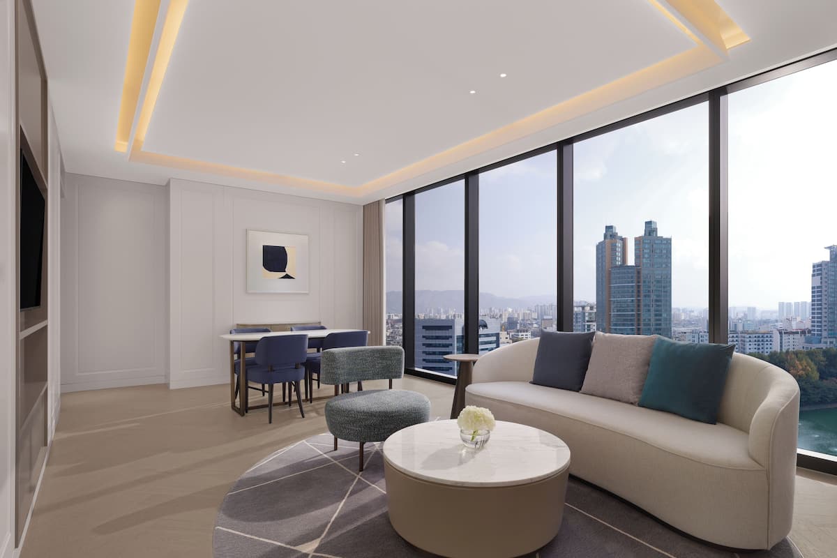 Two-Bedroom Executive King Suite with Lake View | Living area | 55-inch Smart TV with digital channels, TV, smart speakers