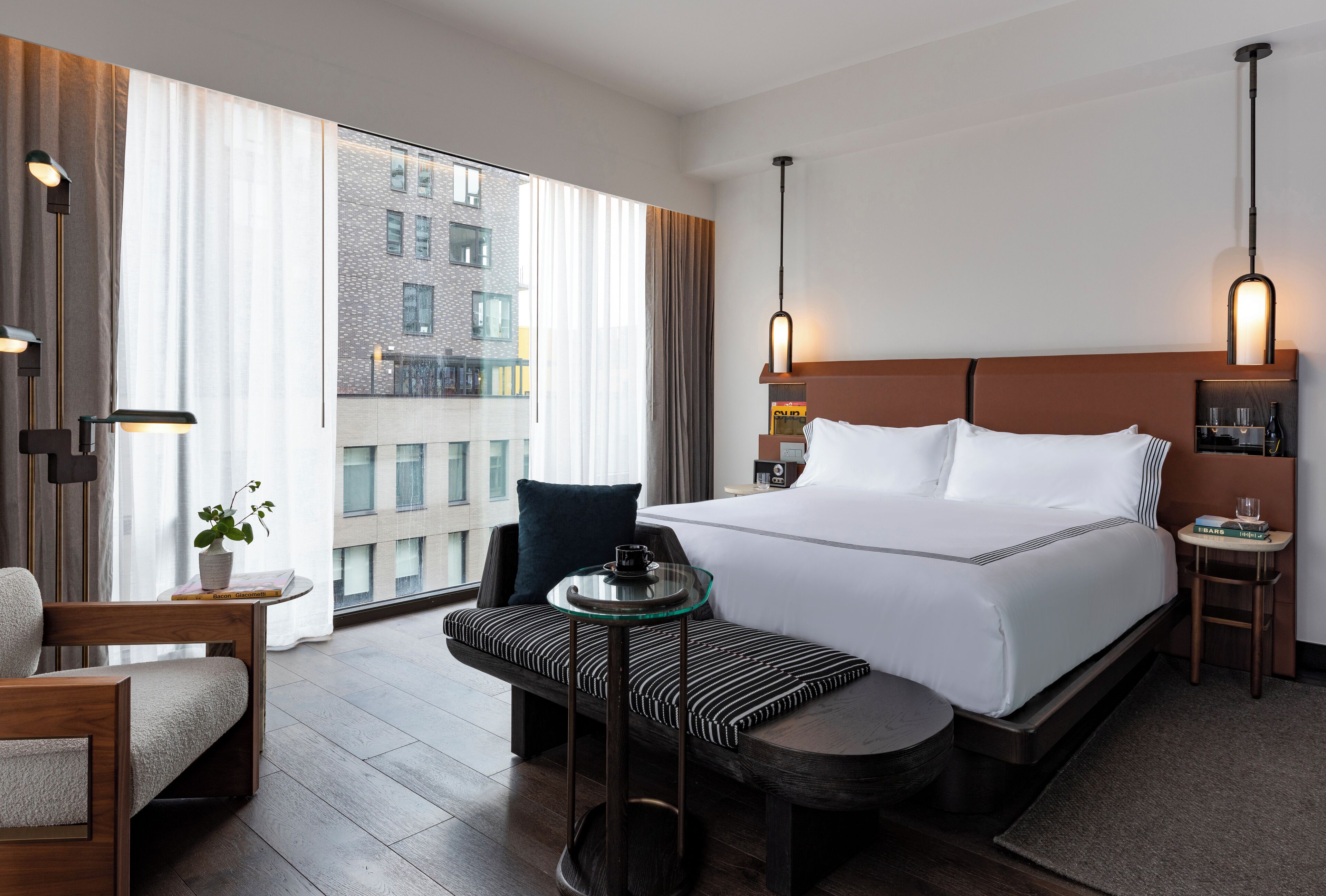 Skyline Studio | Premium bedding, down comforters, pillowtop beds, minibar