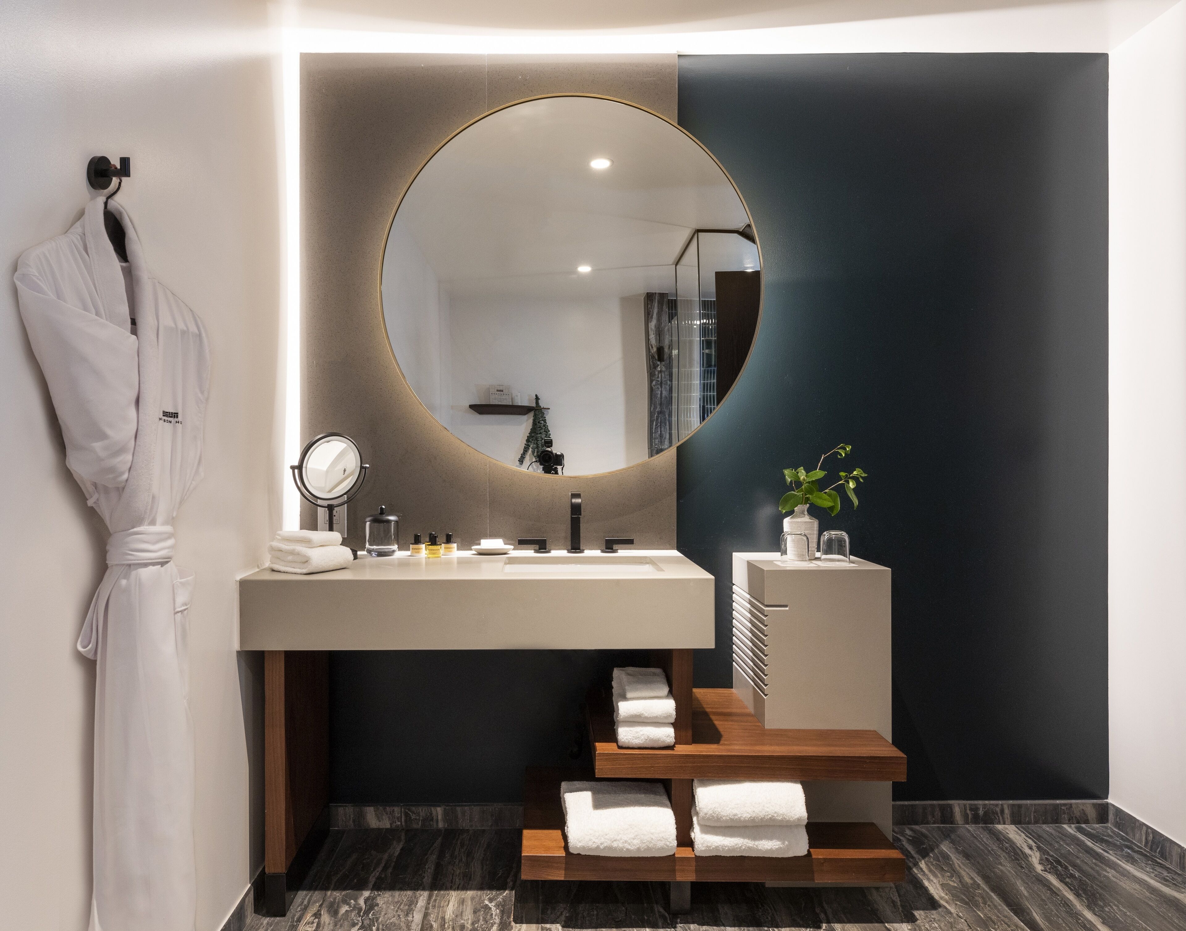 designer toiletries, hair dryer, bathrobes, slippers