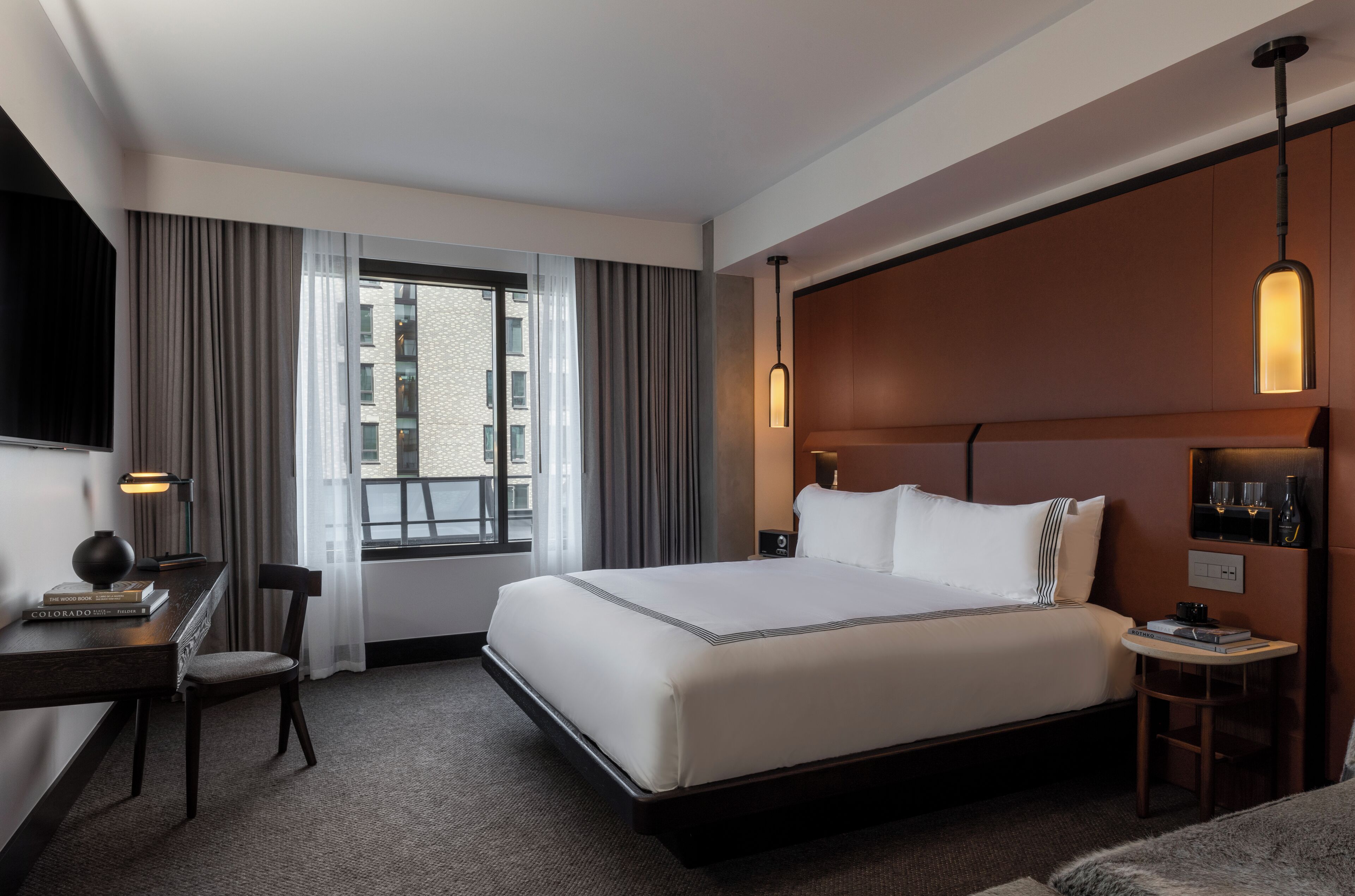 Premium bedding, down comforters, pillowtop beds, minibar