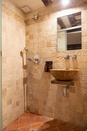 Bathtub, hair dryer, towels, soap