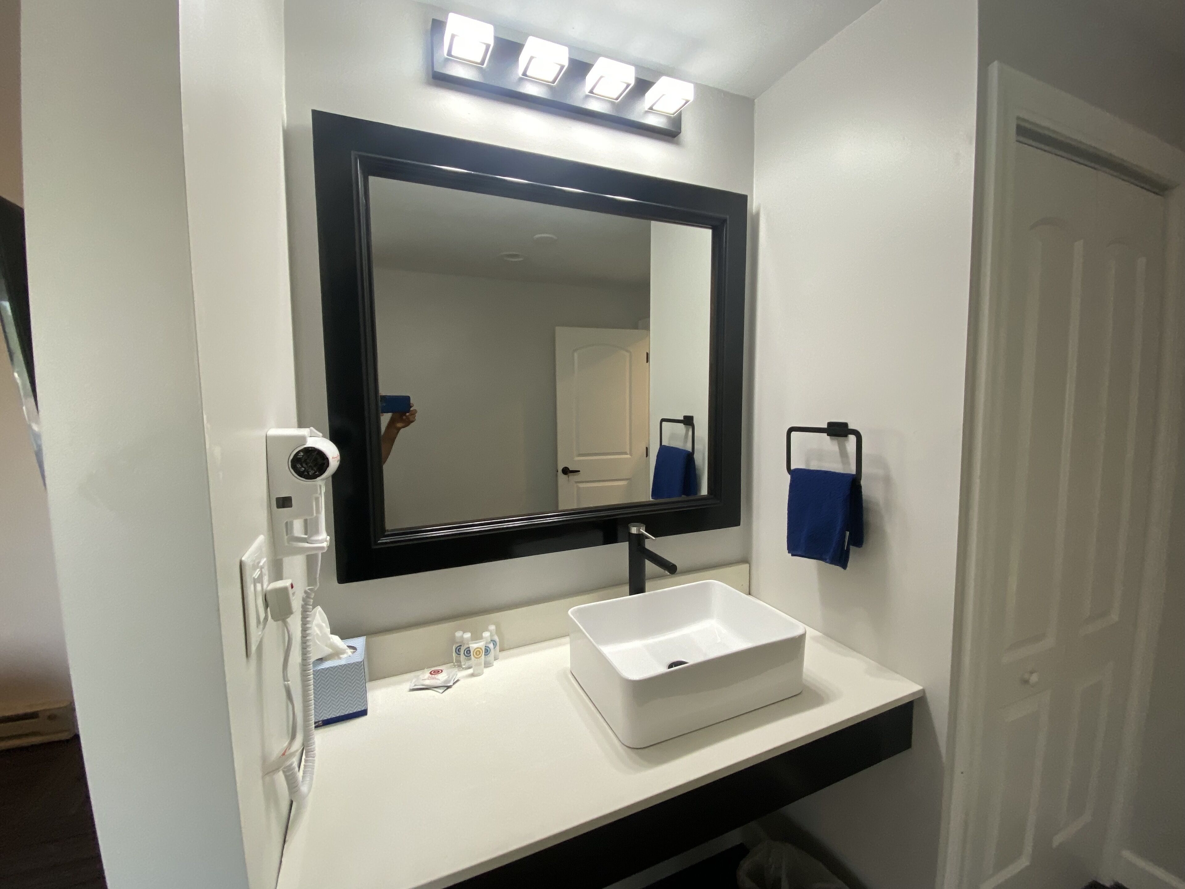 Combined shower/tub, hair dryer, towels, soap