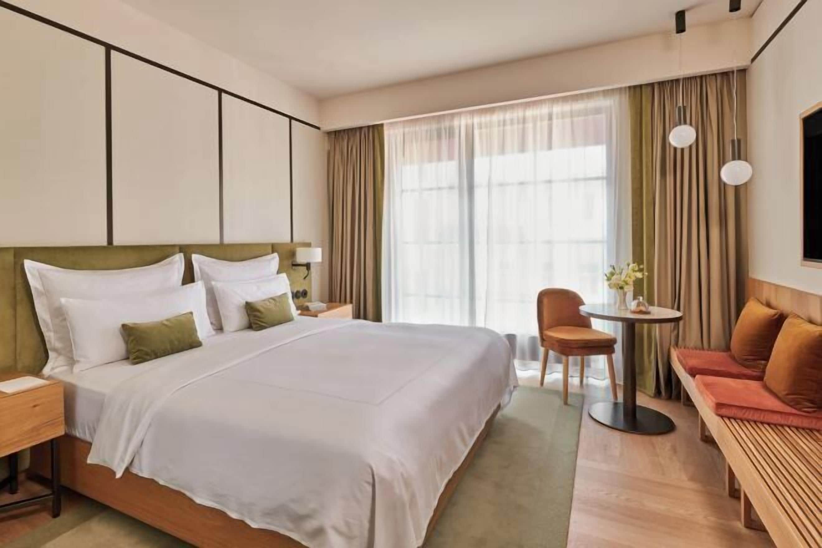 Egyptian cotton sheets, premium bedding, down comforters, in-room safe