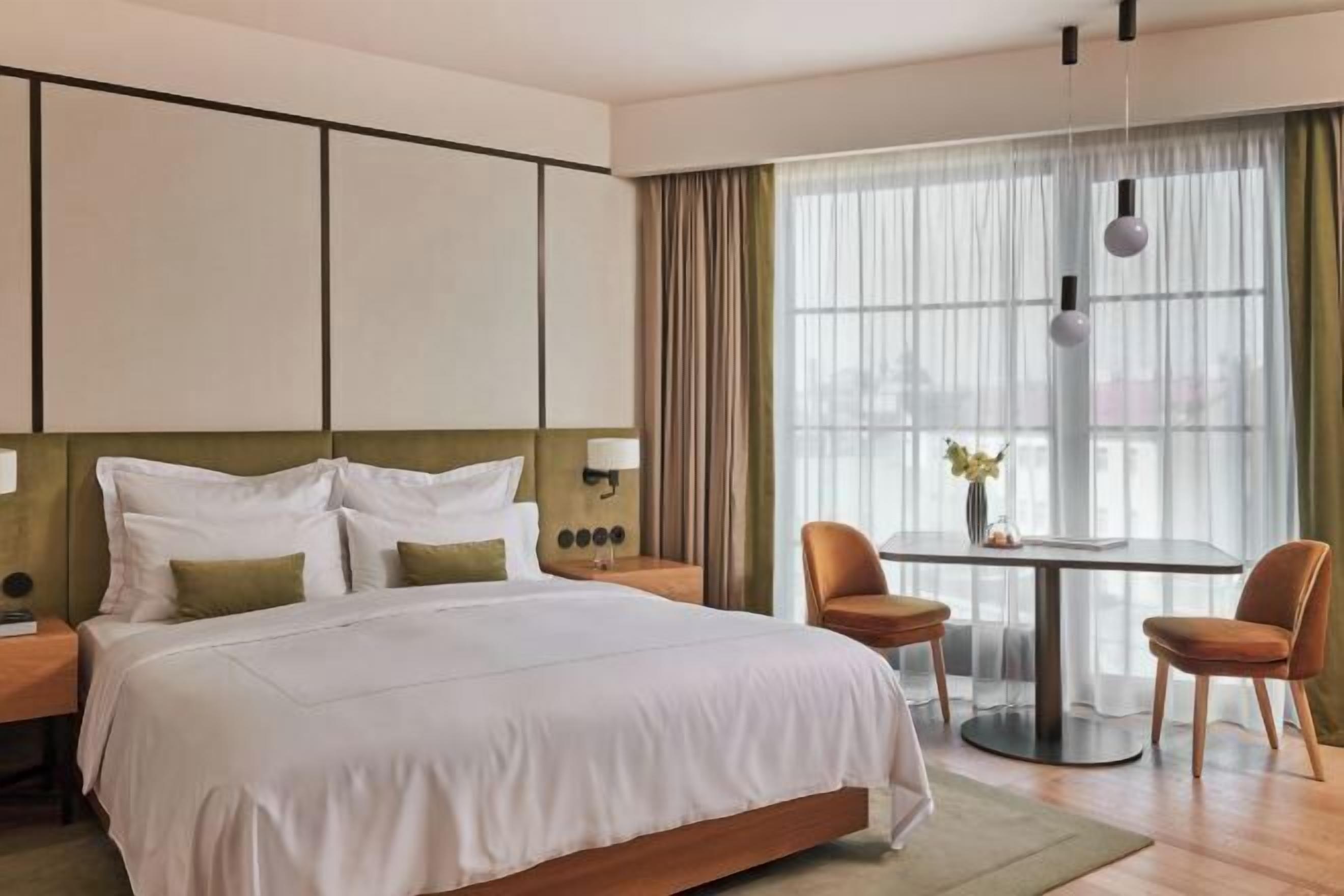 Egyptian cotton sheets, premium bedding, down comforters, in-room safe