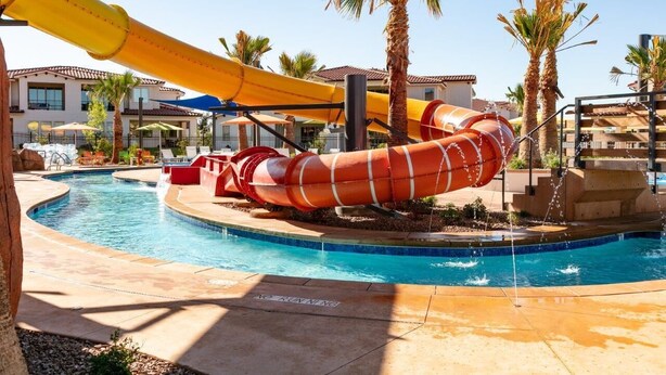 A water park with a large slide and a pool. - Arcadia 50 | Shuffleboard * Sleeps 22 * Views of Red Rocks (Santa Clara)