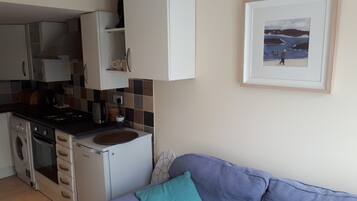 Apartament | Sala d'estar | Televisor de 30 polzades amb canals digitals