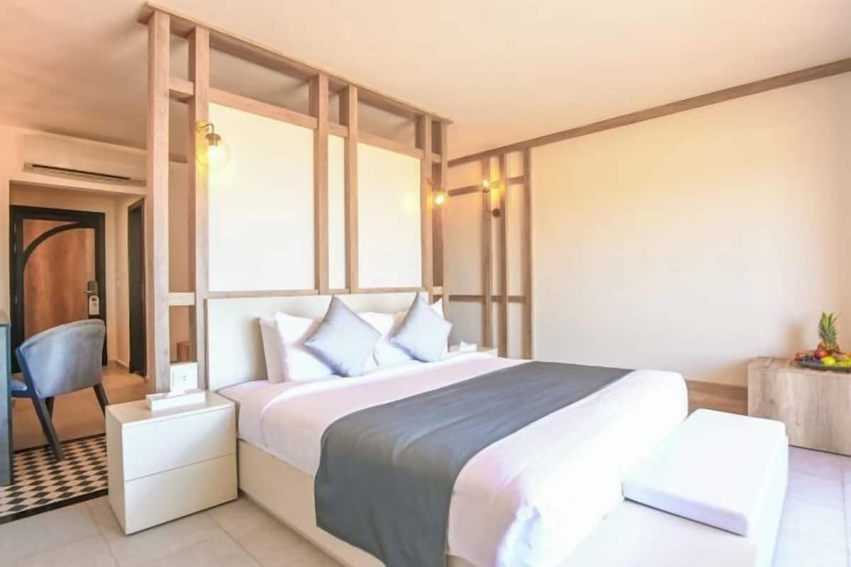 Free minibar items, in-room safe, blackout curtains, iron/ironing board