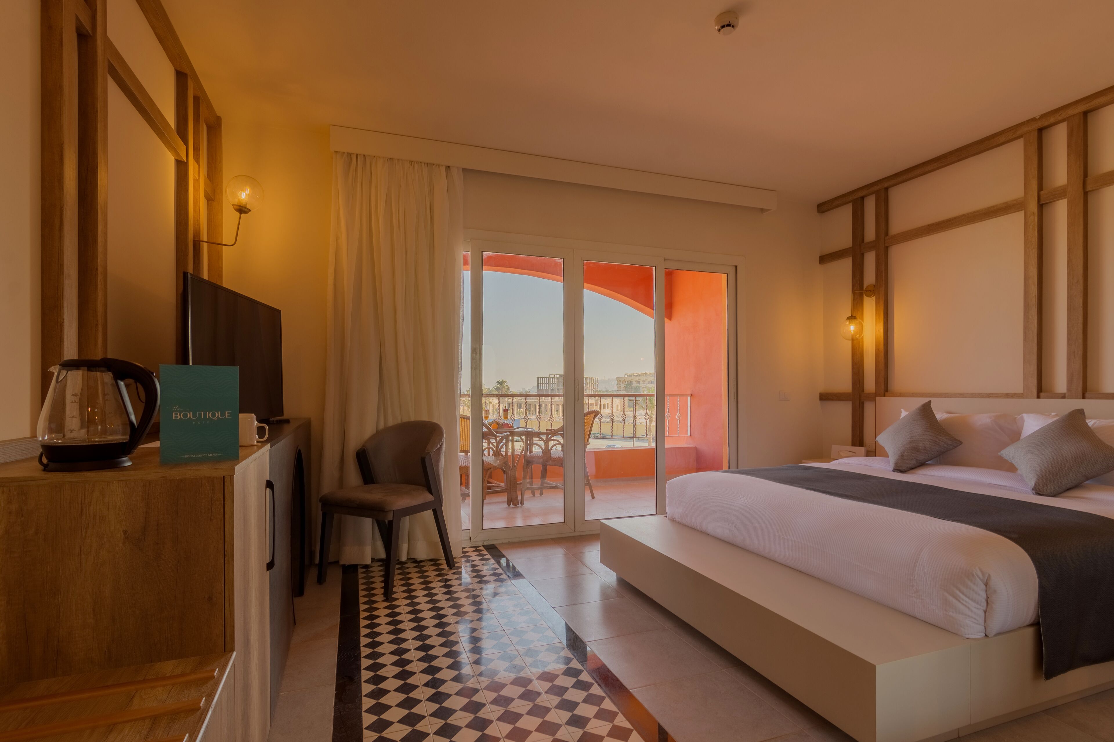 Deluxe Room, Sea View | Free minibar items, in-room safe, blackout drapes, iron/ironing board