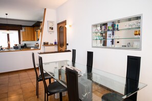Classic Apartment, 2 Bedrooms | Living area | Flat-screen TV