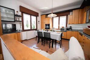 Classic Apartment, 2 Bedrooms | Living area | Flat-screen TV