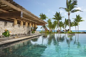 7 bars/lounges, 2 swim-up bars, poolside bar, beach bar