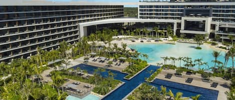 7 outdoor pools, open 8:00 AM to 6:00 PM, pool cabanas (surcharge)