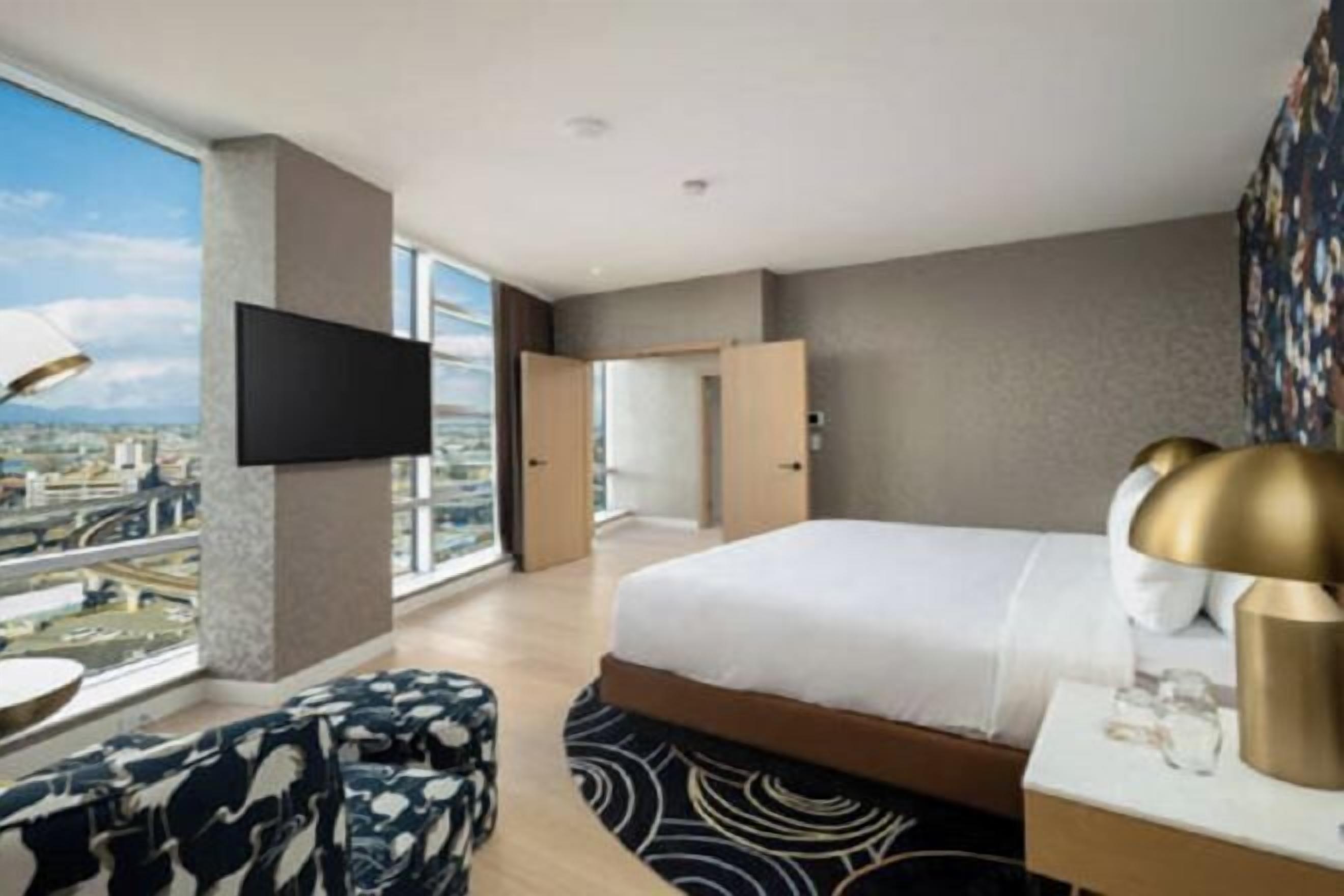 Premium bedding, down comforters, pillowtop beds, minibar