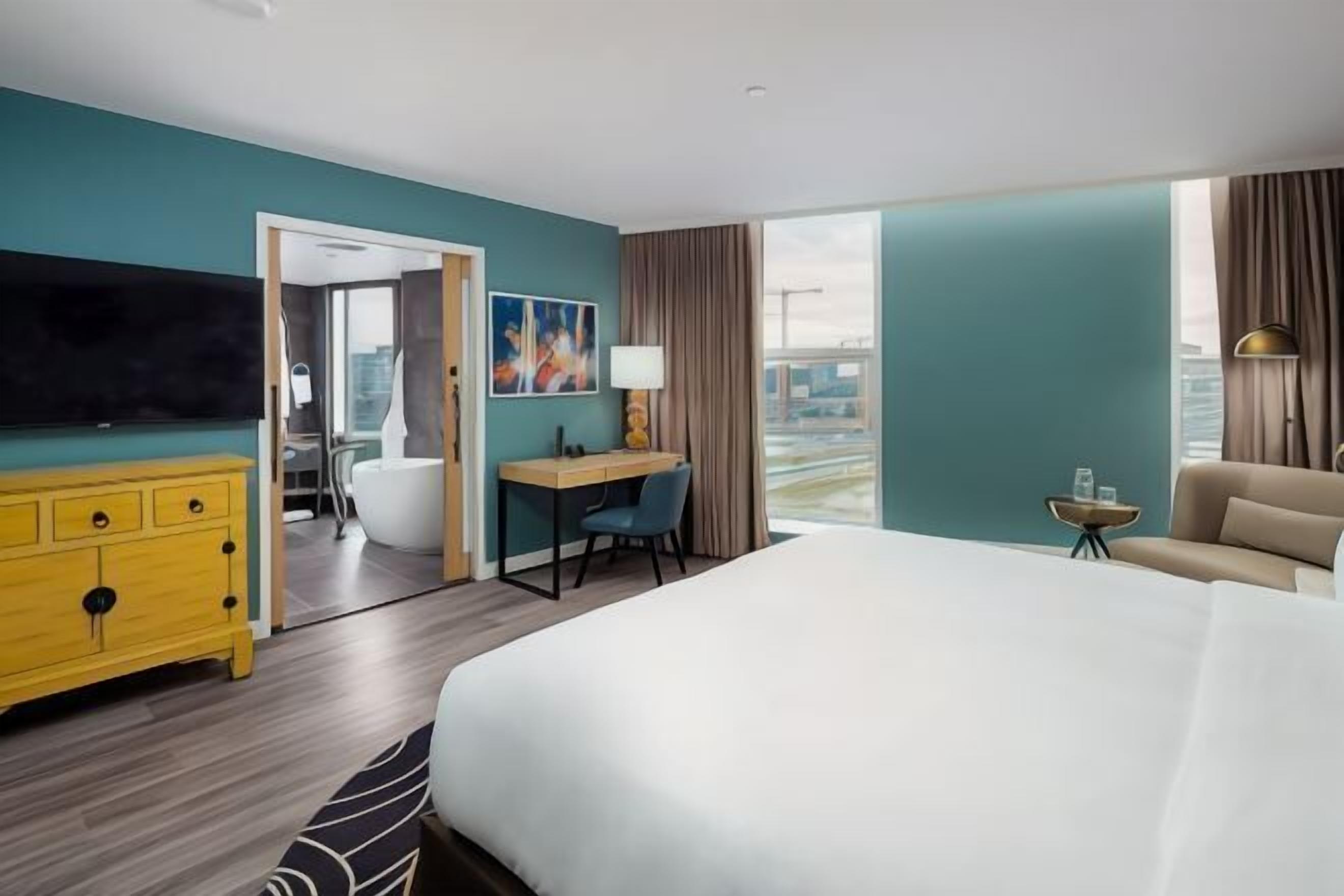 Premium bedding, down comforters, pillowtop beds, minibar