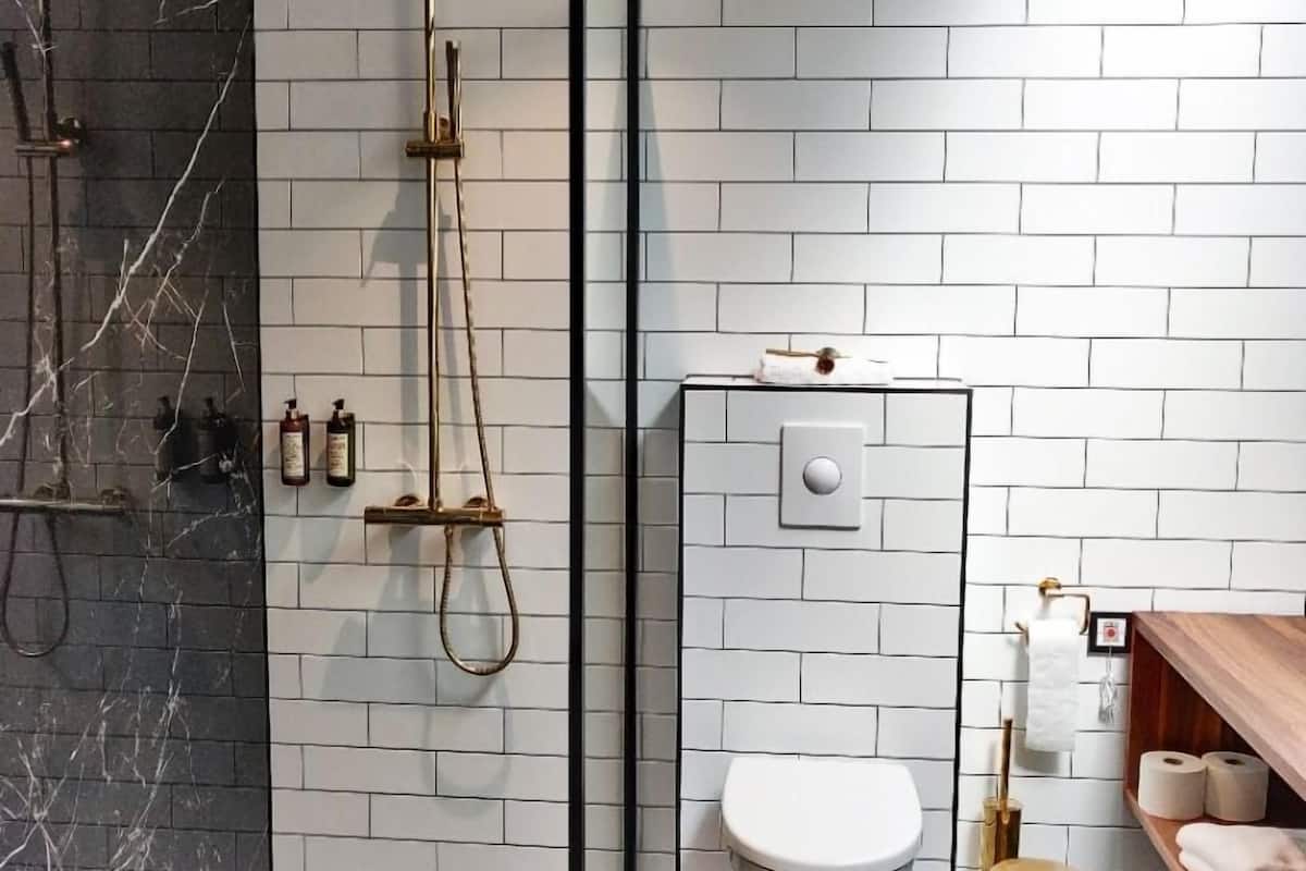 premium double room | bathroom | shower, rainfall showerhead, hair dryer, heated floors