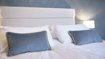 Apartemen Desain, 2 kamar tidur | Bantalan ekstra lembut, tirai kedap cahaya, dan seprai linen