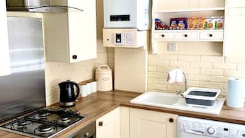 Design Apartment, 2 Bedrooms | Private kitchen | Fridge, microwave, oven, coffee/tea maker