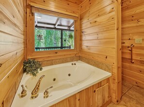 Shower, jetted tub, hair dryer, towels