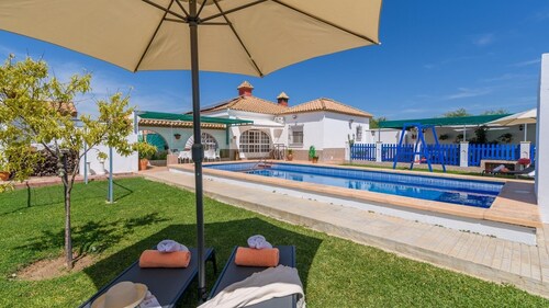 Casa Rural Entre Olivos La Puebla de Cazalla by Ruralidays