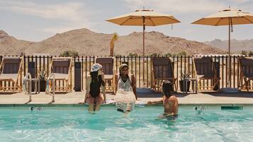 Outdoor pool, open 8:00 AM to 10:00 PM, pool umbrellas, pool loungers