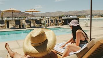 Outdoor pool, open 8:00 AM to 10:00 PM, pool umbrellas, sun loungers