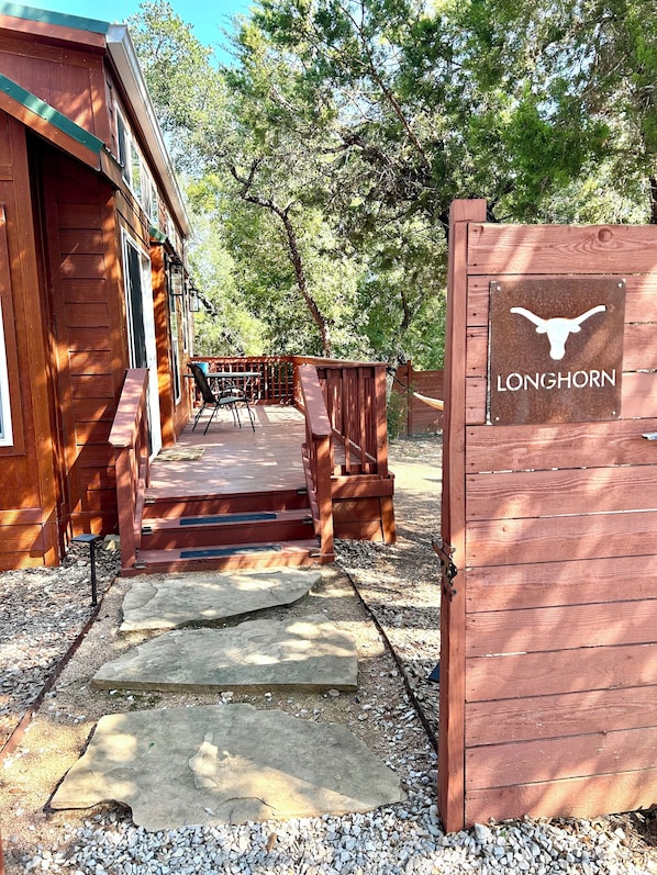 Property grounds - Tiny home cabin rentals on gated 2 acres and shared pool! Only 14mi to downtown! (Austin)
