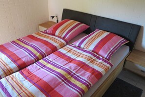 2 bedrooms, travel crib, WiFi, bed sheets