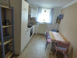 Fridge, oven, high chair