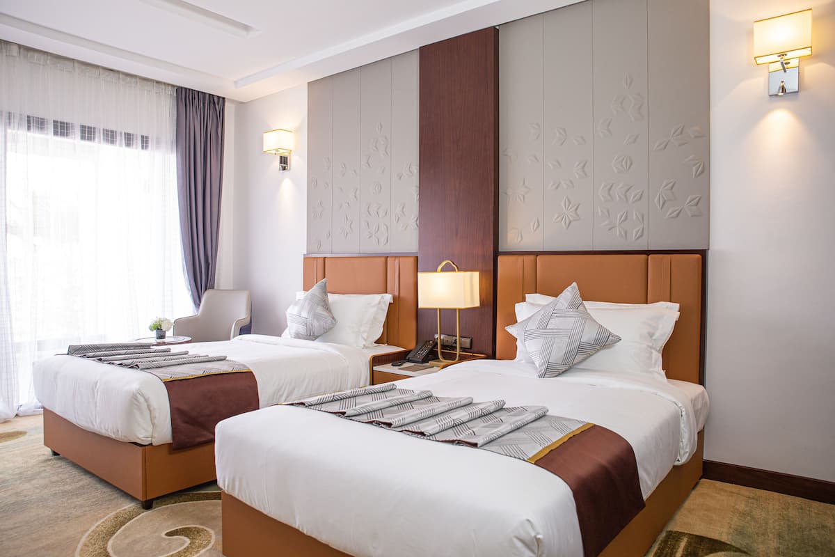 Deluxe kamer | 1 slaapkamer, een minibar, een kluis op de kamer, geluiddichte muren