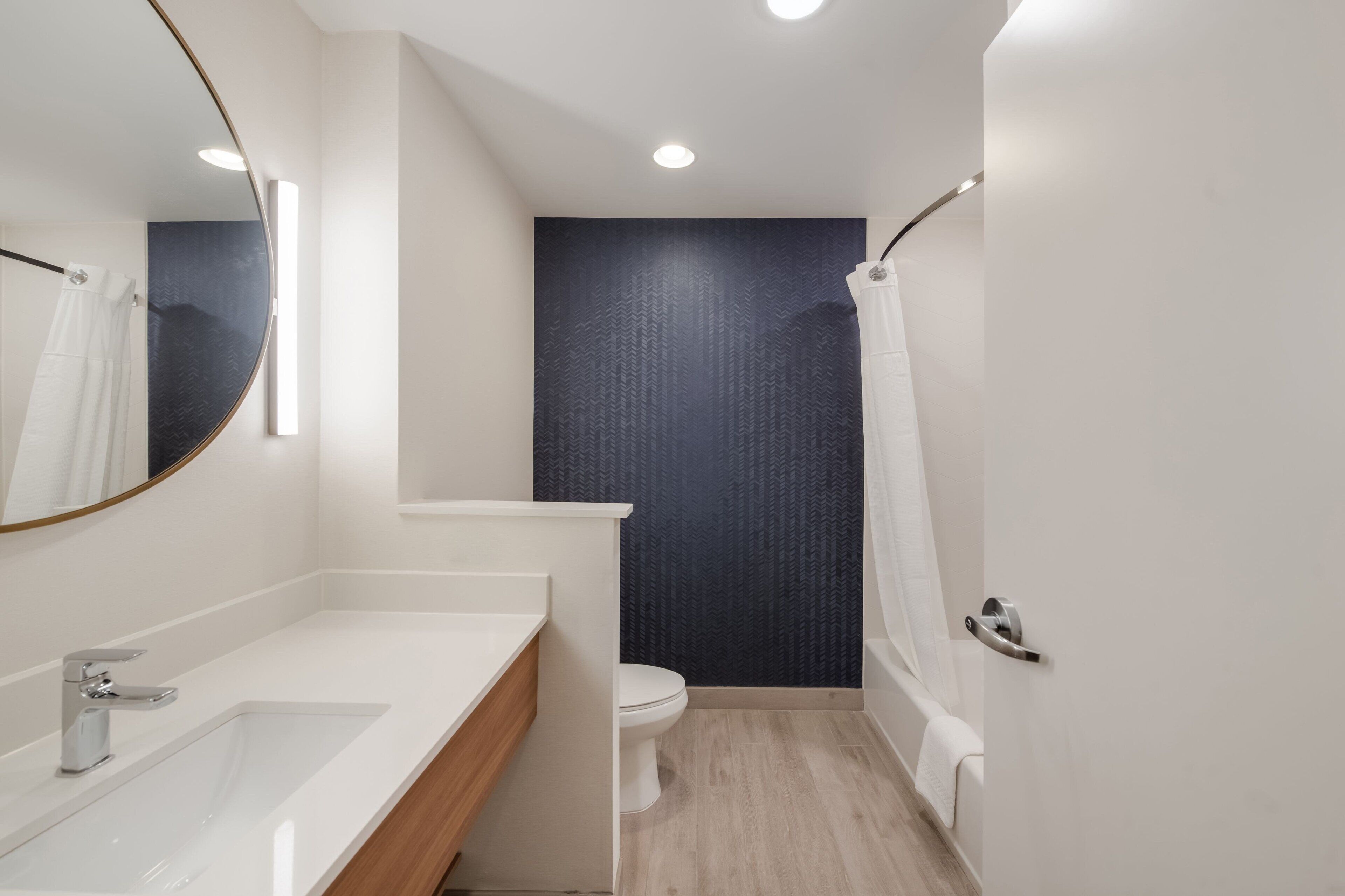 room, 2 queen beds | bathroom | combined shower/bathtub, towels