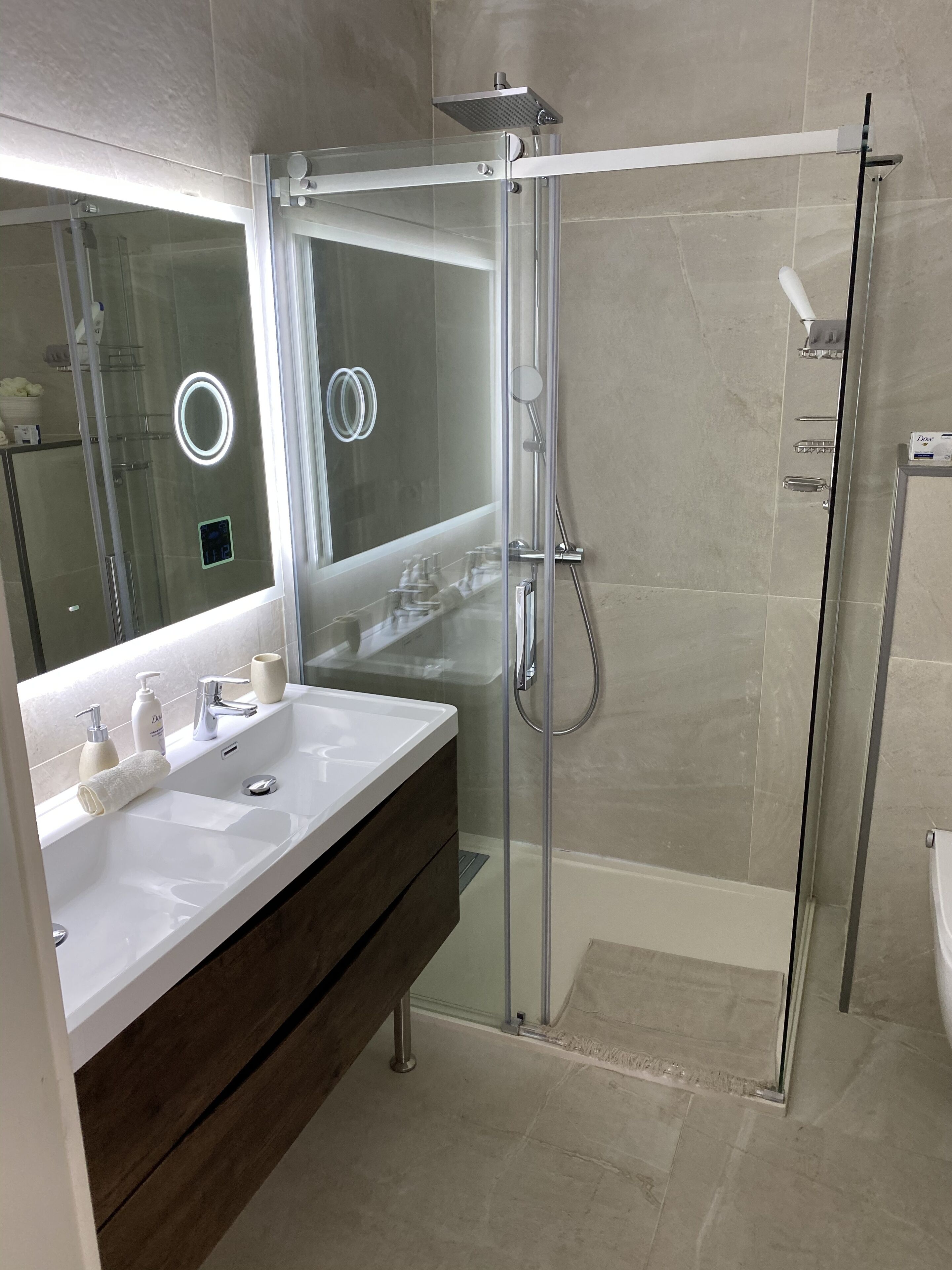 Shower, hair dryer, towels, soap