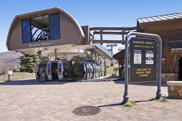 A cabin with a sign indicating it is part of the Riverfront Express 7.