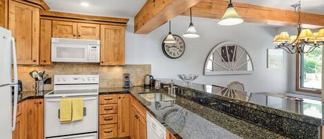 Condo, 2 Bedrooms | Private kitchen | Fridge, oven, stovetop, coffee/tea maker