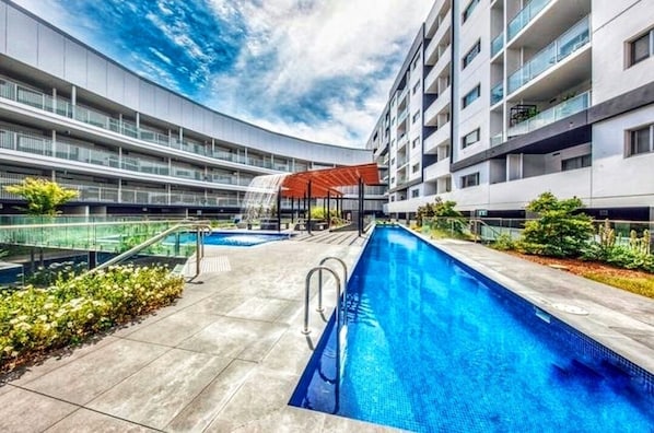 Outdoor pool, a heated pool - Apartment with lake view (Greenway)