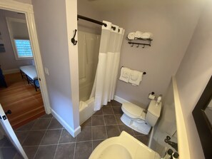 Combined shower/bathtub, hair dryer, towels, soap