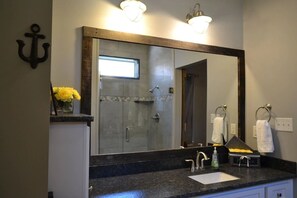 Combined shower/tub, hair dryer, towels, soap